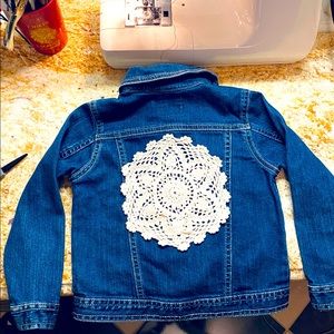 Child’s denim jacket with lace appliqué. Unique.